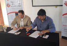 La firma del convenio.