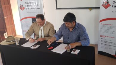 La firma del convenio.