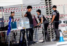 Avalanchas y disparos al aire: así empezó el traslado de miles de migrantes al campamento del puerto de Ceuta